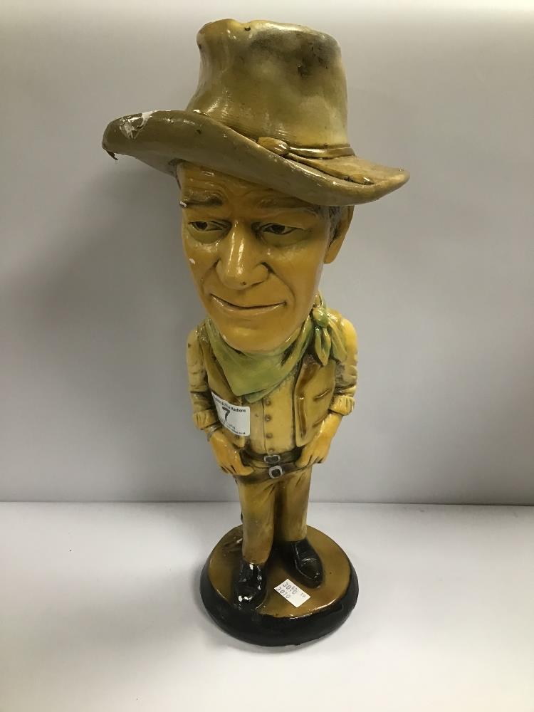 A PAINTED PLASTER FIGURE OF JOHN WAYNE, 43.5CM HIGH