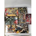 A BOX OF JAPANESE ROBOTS MODEL KITS (PARTS ONLY)