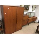 A MID-CENTURY TEAK BEDROOM SUITE BY SYMBOL FURNITURE TUNG/GROOVE DRAWERS COMPRISING OF WARDROBE/