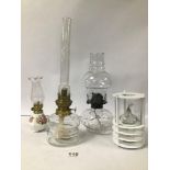 FOUR 20TH CENTURY GLASS OIL LAMPS OF VARYING SHAPES AND SIZES, 39CM HIGH