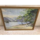 ARTHUR E ARTHUR (20TH CENTURY) A FRAMED AND GLAZED WATERCOLOUR OF A LAKE SCENE, 49CM BY 38CM