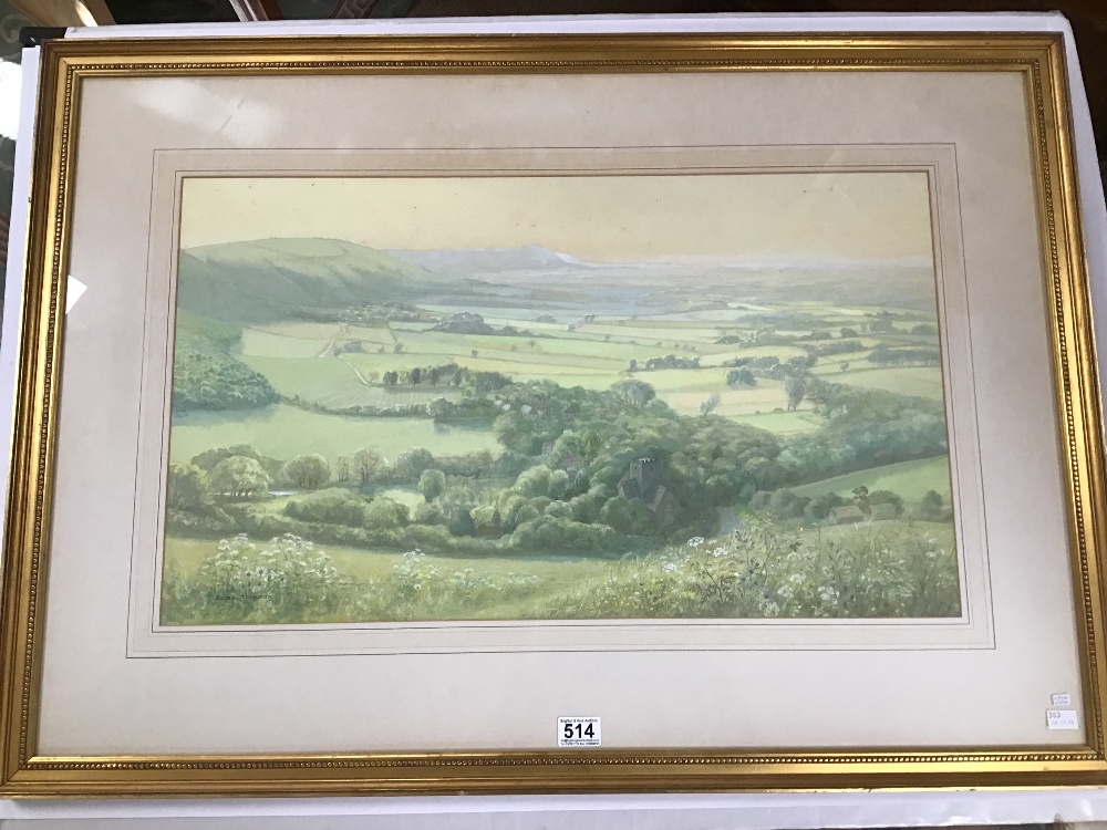 A FRAMED AND GLAZED WATERCOLOUR OF A EXTENSIVE COUNTRY SCENE SIGNED SUSAN JACKMAN 72CM BY 101CM