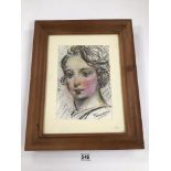 TOM O'DONNELL, A FRAMED AND GLAZED PORTRAIT OF A YOUNG WOMAN, 49CM X 38.5CM