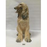 A LARGE ITALIAN FIGURE OF A CERAMIC AFGHAN HOUND, INDISTINCLTY SIGNED TO THE BASE, 41CM HIGH