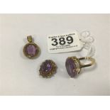 THREE YELLOW METAL ITEMS SET WITH AMETHYST, COMPRISING A RING AND TWO PENDANTS, COMBINED WEIGHT 14.