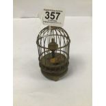 AN UNUSUAL AUTOMATON CLOCK IN THE FORM OF A BIRD IN A BIRDCAGE, 13CM HIGH