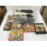 A SINCLAIR ZX SPECTRUM WITH AN ASSORTMENT OF VINTAGE GAMES, INCLUDING BACK TO THE FUTURE PART III,