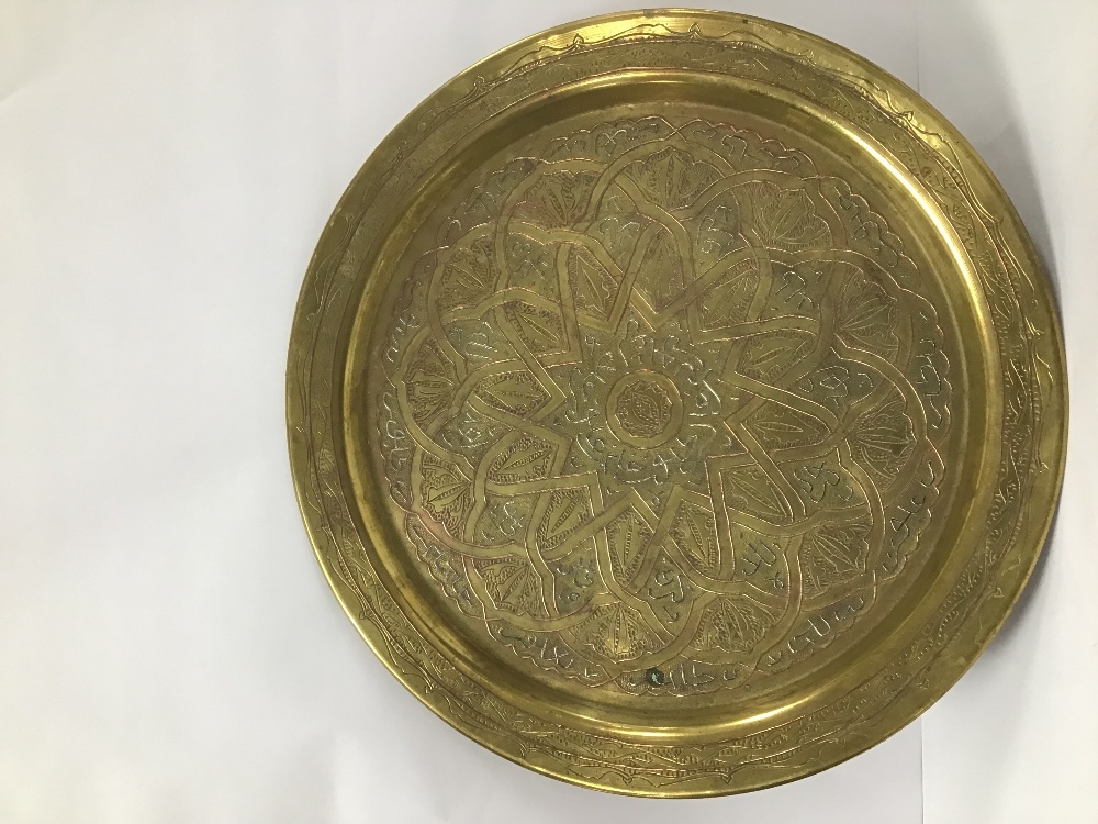 A MIDDLE EASTERN BRONZE AND COPPER CHARGER WITH HIGHLY ENGRAVED AND EMBOSSED DECORATION WITH - Image 2 of 3