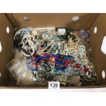 A LARGE QUANTITY OF ASSORTED COSTUME JEWELLERY, INCLUDING EARRINGS, NECKLACES AND MUCH MORE