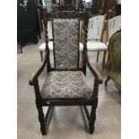 A VICTORIAN OAK THRONE ARM CHAIR BARLEY TWIST