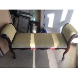 A MAHOGANY TWO SEATER LOVE SEAT WITH VINTAGE FABRIC