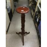 AN ORNATE WOODEN PLANT STAND DECORATED WITH LEAVES AND GRAPES 113 CMS