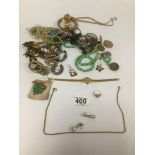 A COLLECTION OF EARLY COSTUME JEWELLERY, INCLUDING EARRINGS, BROOCHES, NECKLACES AND MORE