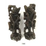 A PAIR OF 19TH CENTURY CHINESE CARVED HARDWOOD FIGURES OF OLD MEN, 31CM HIGH