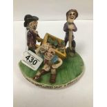 A WIDDECOMBE FAIR CERAMIC FIGURE GROUP OF THREE FARMERS AND A WHEELBARROW, TITLED "BILL BREWER,