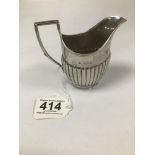 A LATE VICTORIAN SILVER HALF FLUTED CREAM JUG, HALLMARKED LONDON 1891 BY THE ARMY AND NAVY