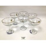 A SET OF SIX VINTAGE BABYCHAM GLASSES