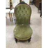 A VICTORIAN BUTTON BACK VELVET BEDROOM CHAIR ON ORIGINAL CASTORS