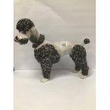 A LARGE GLAZED CERAMIC FIGURE OF A STANDING POODLE, 39CM HIGH
