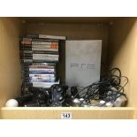 A SILVER PLAYSTATION 2 WITH TWO CONTROLLERS, TOGETHER WITH A QUANTITY OF PS2 AND PS3 GAMES