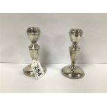 A PAIR OF SILVER CIRCULAR CANDLESTICKS, HALLMARKED BIRMINGHAM 1965 BY J B CHATTERLEY AND SONS, 12.