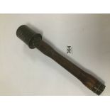 A WWII GERMAN STYLE STICK GRENADE WITH STAMPED MARKS THROUGHOUT, FUSE AND MARBLE PRESENT UNDER