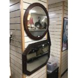 AN ARTS AND CRAFTS OAK BEVELLED MIRROR WITH ONE OTHER