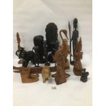 A QUANTITY OF CARVED WOODEN AFRICAN FIGURES, INCLUDING TRIBES PEOPLE AND ANIMALS, LARGEST 35.5CM