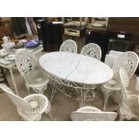 A GALVANISED GARDEN TABLE WITH SIX GALVANISED CHAIRS, TABLE COMES WITH A MARBLE TOP