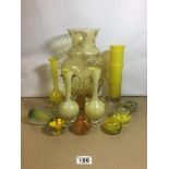 A COLLECTION OF MOSTLY YELLOW GLASSWARE, INCLUDING PAPERWEIGHTS, PAIR OF TWIN HANDLED VASES, A LARGE