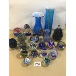 A COLLECTION OF COLOURED GLASSWARE, COMPRISING MOSTLY PAPERWEIGHTS, TWO BEING CAITHNESS, VASES AND