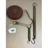 AN EARLY CHESTERMAN LEATHER BOUND ROUND TAPE MEASURE, 11CM DIAMETER, TOGETHER WITH TWO SET OF