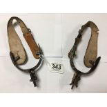 A PAIR OF MEXICAN CHIHUAHUA SPURS WITH SILVER INLAY THROUGHOUT ON STEEL, WITH ORIGINAL LEATHER