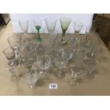 A COLLECTION OF DRINKING GLASSES INCLUDING GEORGIAN AND VICTORIAN, SOME BEING 19TH CENTURY AND