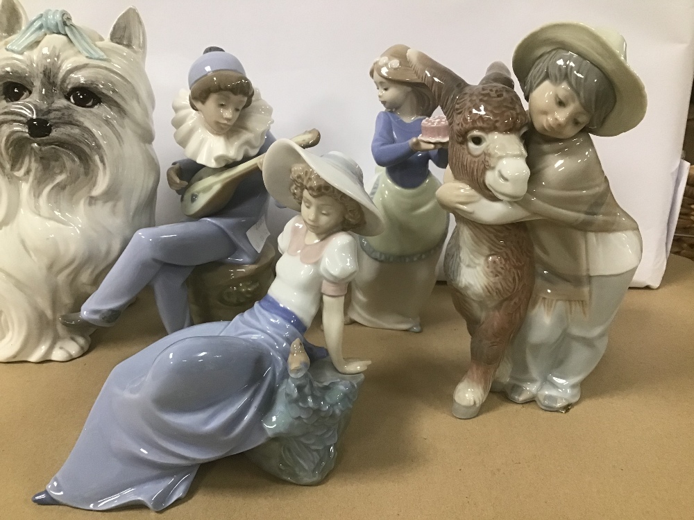 A LLADRO PORCELAIN FIGURE OF A BOY WITH DONKEY TOGETHER WITH THREE NAO FIGURES LARGEST 20CM HIGH AND - Image 2 of 6