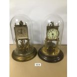 TWO 20TH CENTURY BRASS ANNIVERSARY CLOCKS WITH GLASS DOMES, ONE BY SCHATZ, LARGEST 30CM HIGH