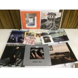 A SMALL ASSORTMENT OF VINYL RECORD ALBUMS, INCLUDING BASTILLE, WHAM, BON JOVI AND MORE