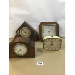 AN OAK CASED FRENCH MANTLE CLOCK, THE ENAMEL DIAL WITH ARABIC NUMERALS DENOTING HOURS, TOGETHER WITH