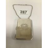 A GEORGE V SILVER PURSE OF RECTANGULAR FORM WITH CHAIN, GILT INTERIOR, HALLMARKED BIRMINGHAM 1918 BY