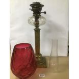 A LATE HINKS AND SON 19TH CENTURY BRASS OIL LAMP WITH CLEAR GLASS RESERVOIR, ALCO CRANBERRY GLASS