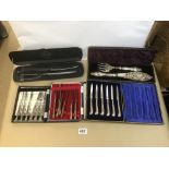 TWO SETS OF SIX SILVER HANDLED KNIVES, A SET OF SIX SILVER HANDLED CAKE FORKS, A LARGE SILVER