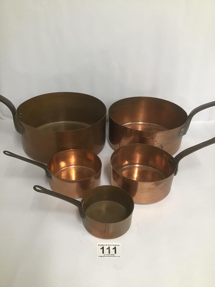 A SET OF FIVE COPPER SAUCEPANS OF GRADUATED FROM, LARGEST 34CM LONG