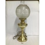 A 20TH CENTURY CONVERTED BRASS TABLE LAMP WITH ETCHED GLASS SHADE AND FUNNEL, 53CM HIGH