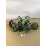 A GROUP OF SIX GREEN GLASS PAPERWEIGHTS AND A SIMILAR DISH, MOST MARKED TO BASE MDINA