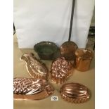 COPPER MOULDS IN THE SHAPE OF A FISH, ONE SHAPED AS GRAPES AND ANOTHER, TOGETHER WITH A METAL