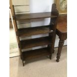 AN ARTS AND CRAFTS OAK FOUR TIER BOOKSHELF