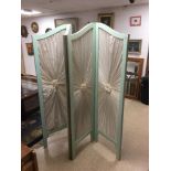 A VINTAGE FOUR FOLDING WOODEN SURROUND SCREEN WITH SILK