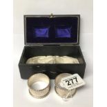 A MODERN PAIR OF SILVER NAPKIN RINGS WITH ROPE TWIST BORDERS IN ORIGINAL BOX, HALLMARKED