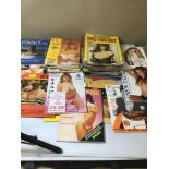 AN ASSORTMENT OF VINTAGE ADULT MENS RISQUE MAGAZINES, APPROX 34 IN TOTAL