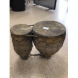 A SET OF DJEMBE CLAY AND GOAT SKIN DRUMS 37CM WIDE